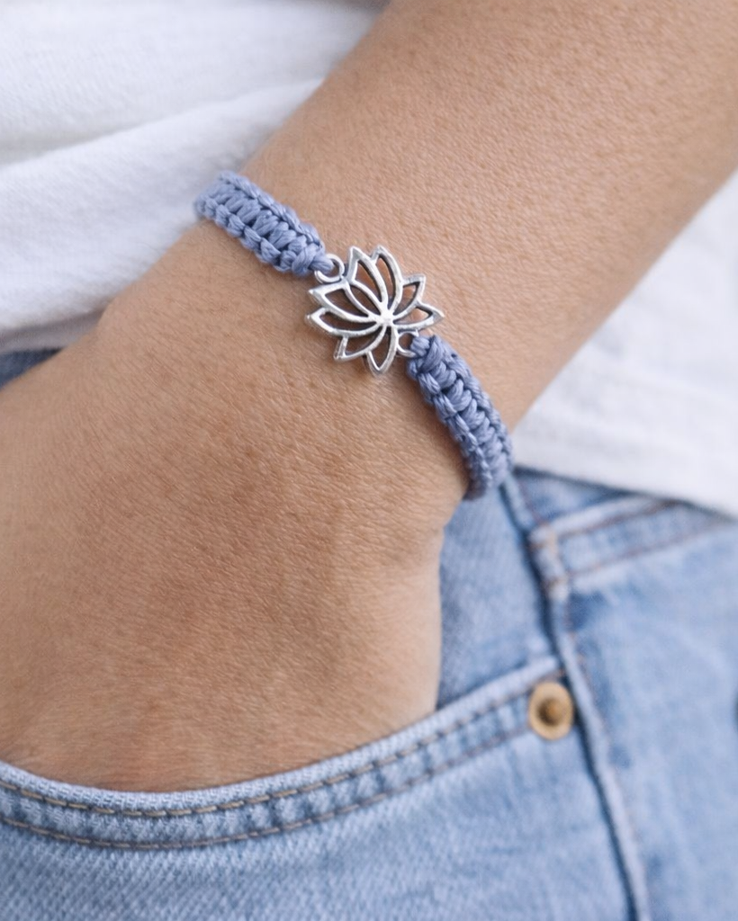 Adjustable macrame lotus bracelet with silver lotus charm