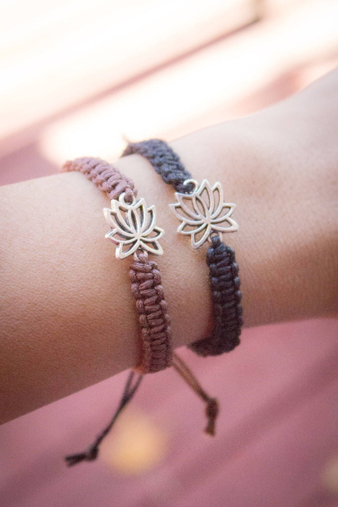 Boho handmade lotus charm bracelet on wrist