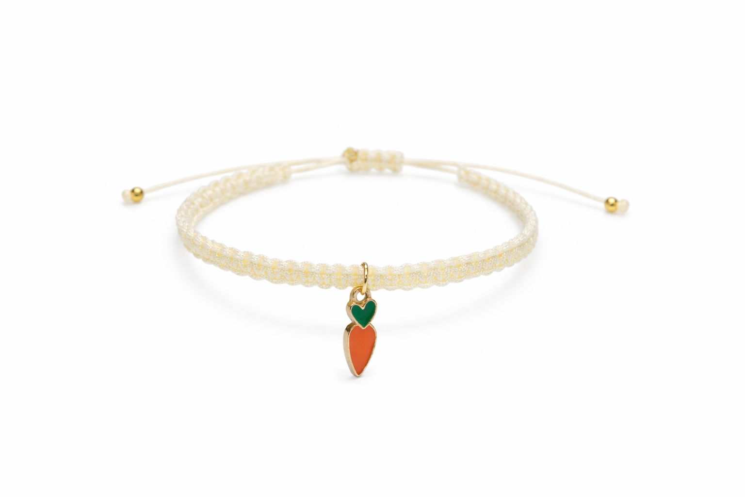 Bracelet with a carrot-shaped charm on a white background