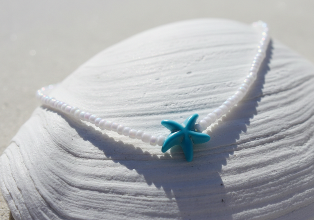 Close-up of starfish charm on seed bead necklace beach jewelry