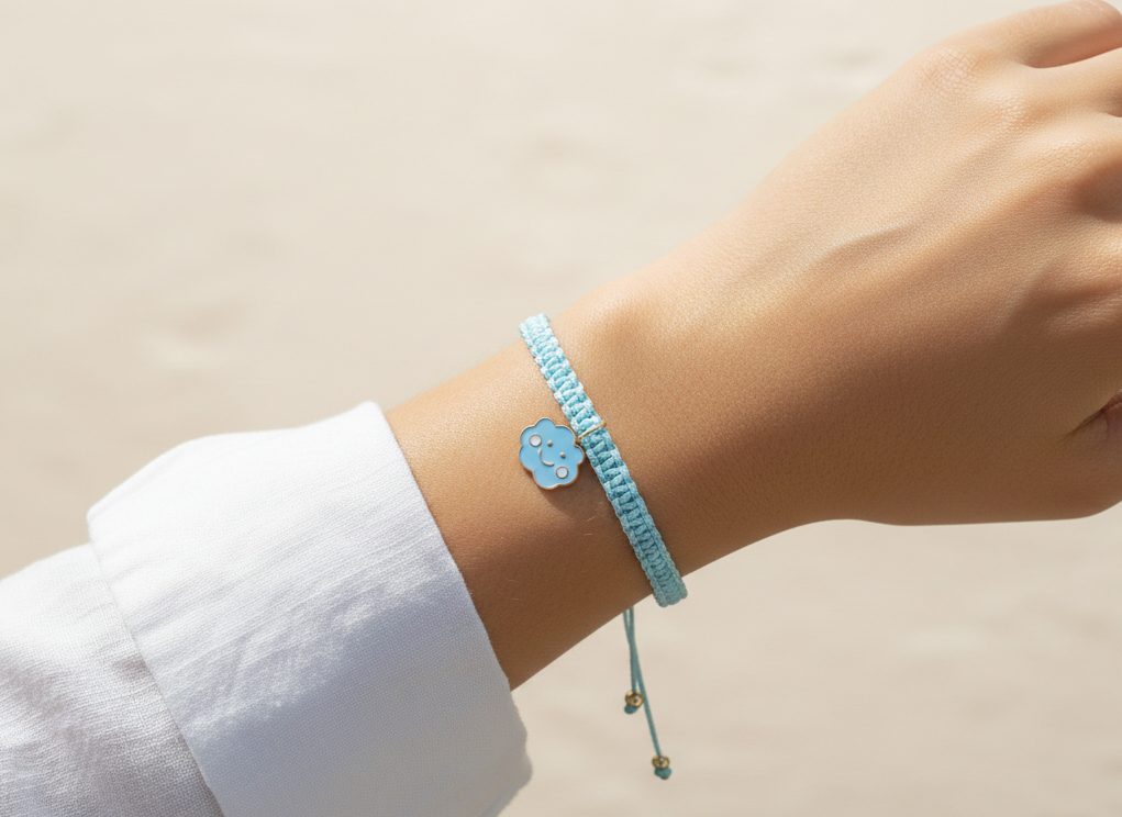 Cloud charm bracelet worn on wrist aesthetic outfit