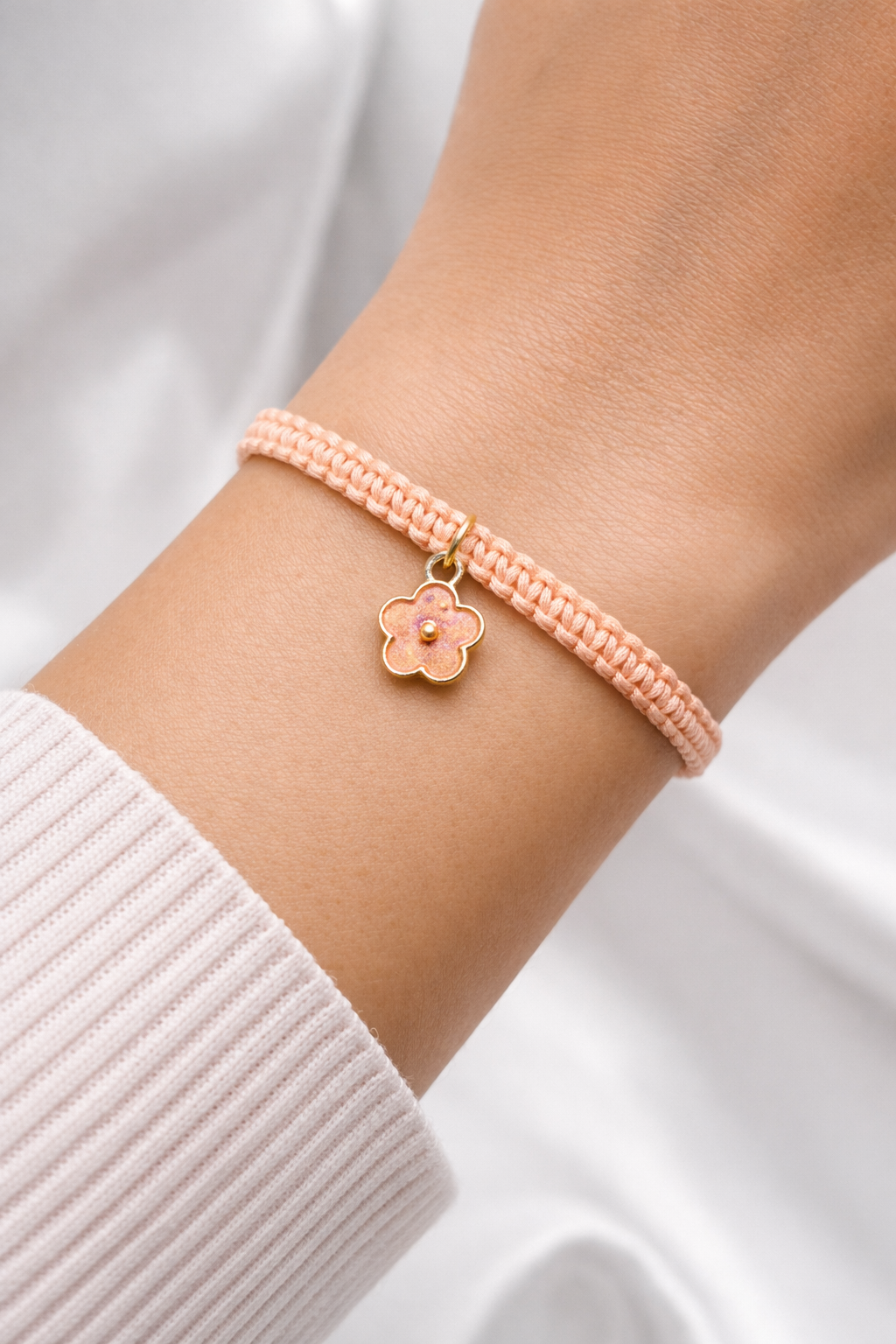Flower charm bracelet worn on wrist, adjustable boho jewelry for women