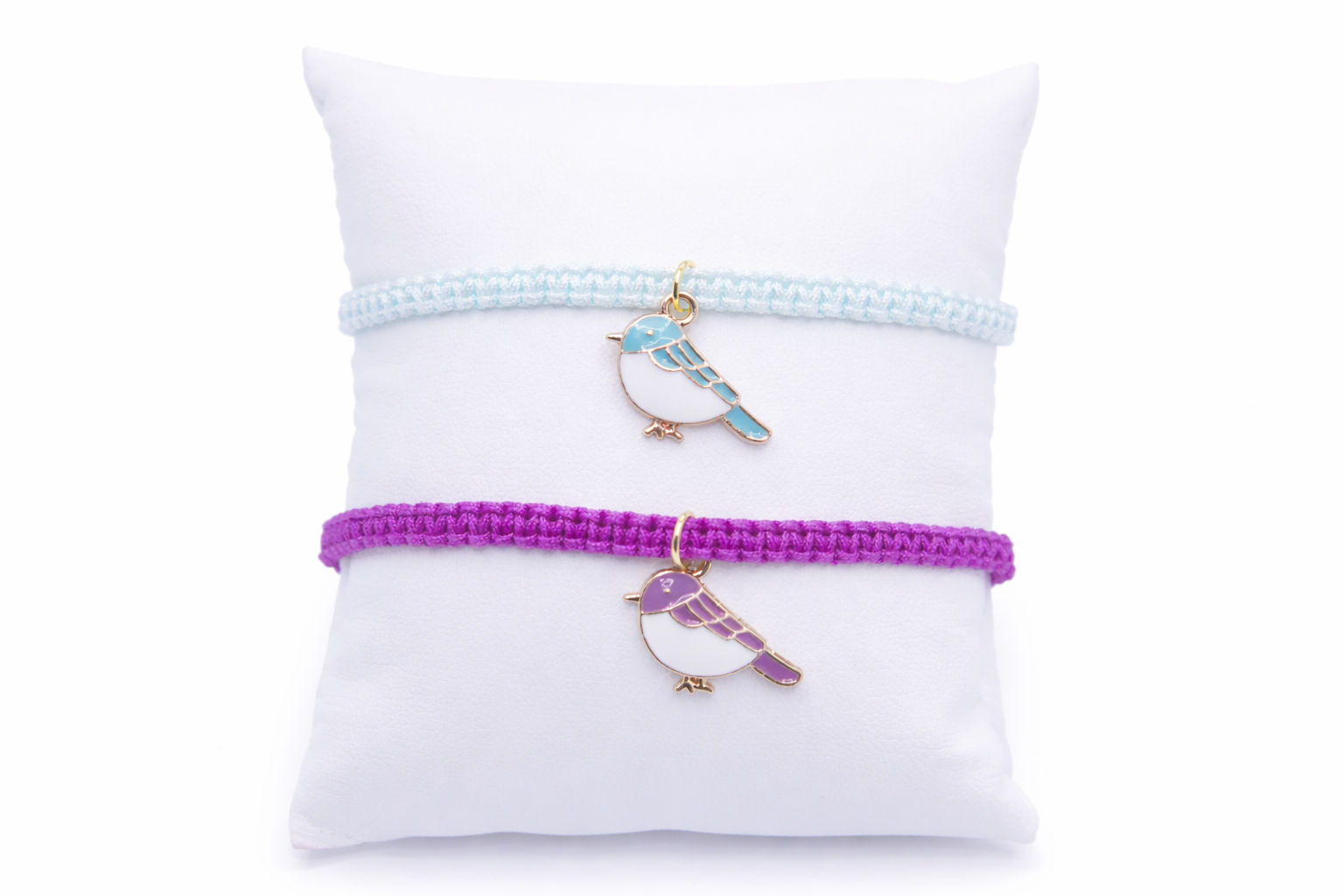 Handmade bird charm adjustable bracelet in purple and green cord, friendship and good luck jewelry