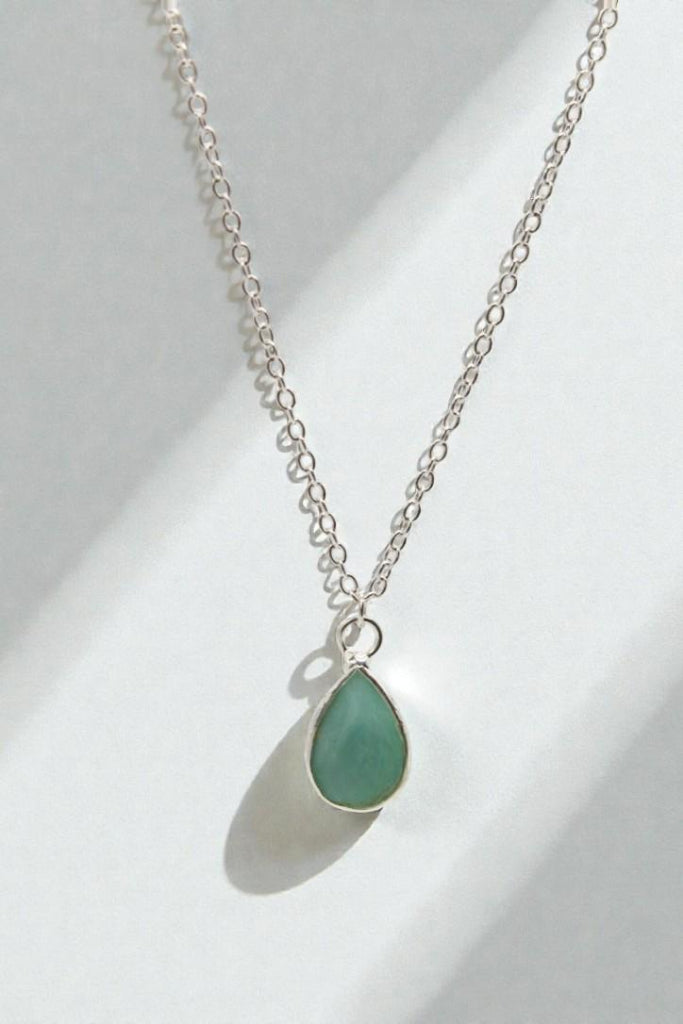 Minimalist gemstone teardrop pendant necklace close up