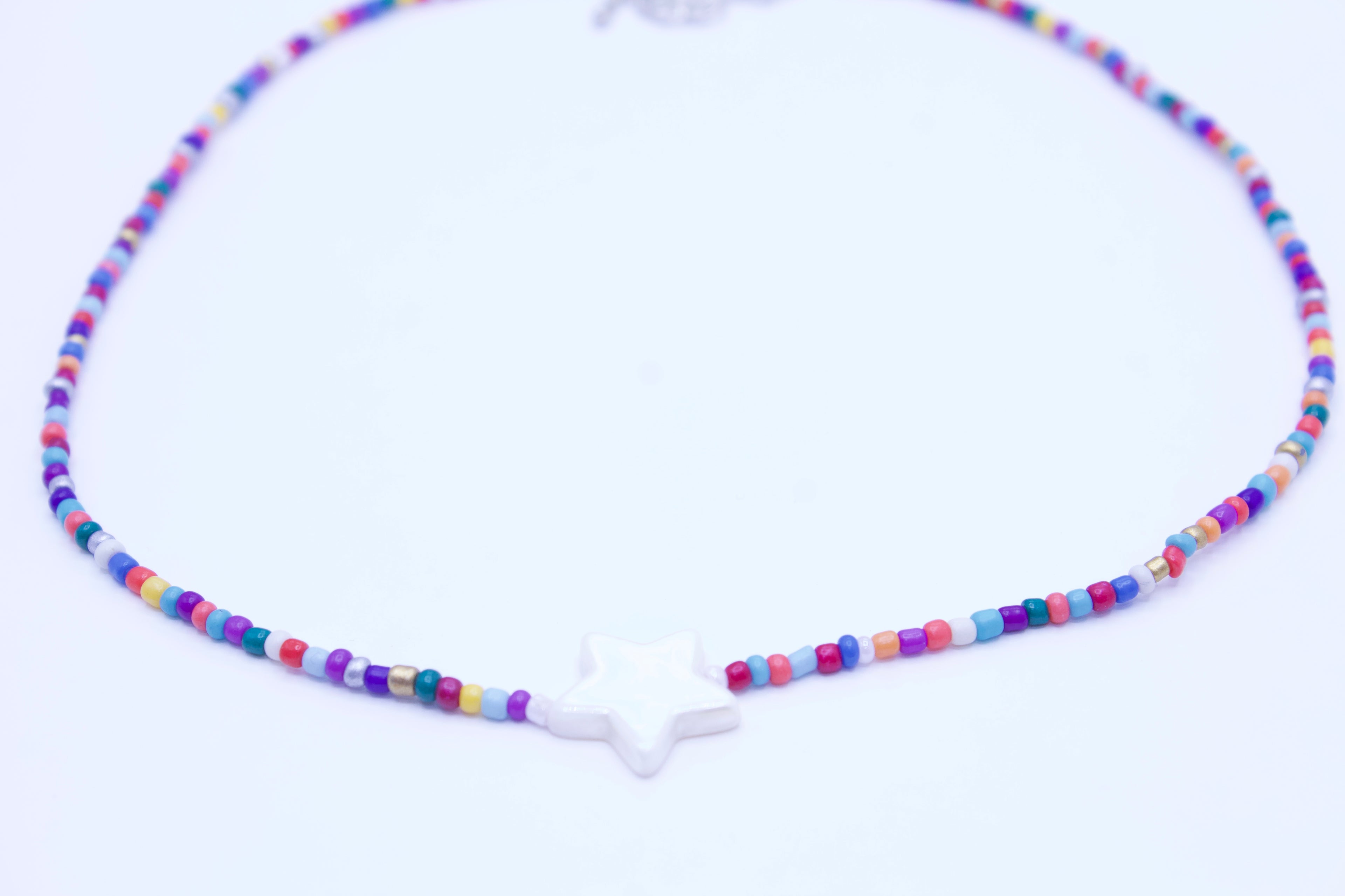 Multicolored beaded necklace on a white background