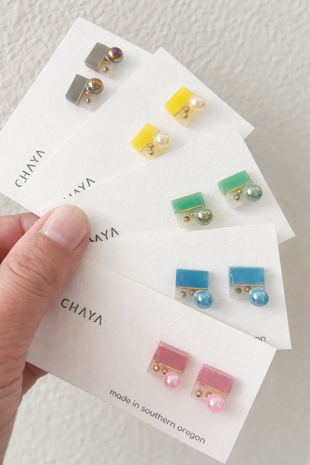 Upcycled resin geometric stud earrings with pearl accent in modern handmade design