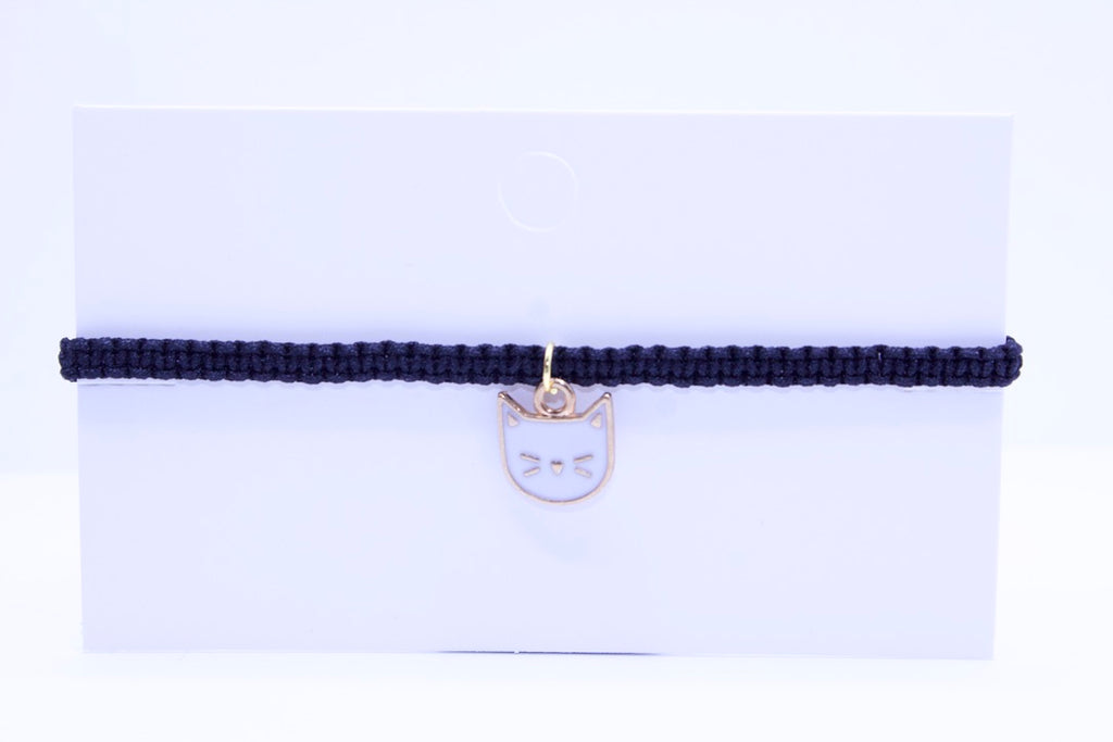 black beaded bracelet with a cat charm on a white background