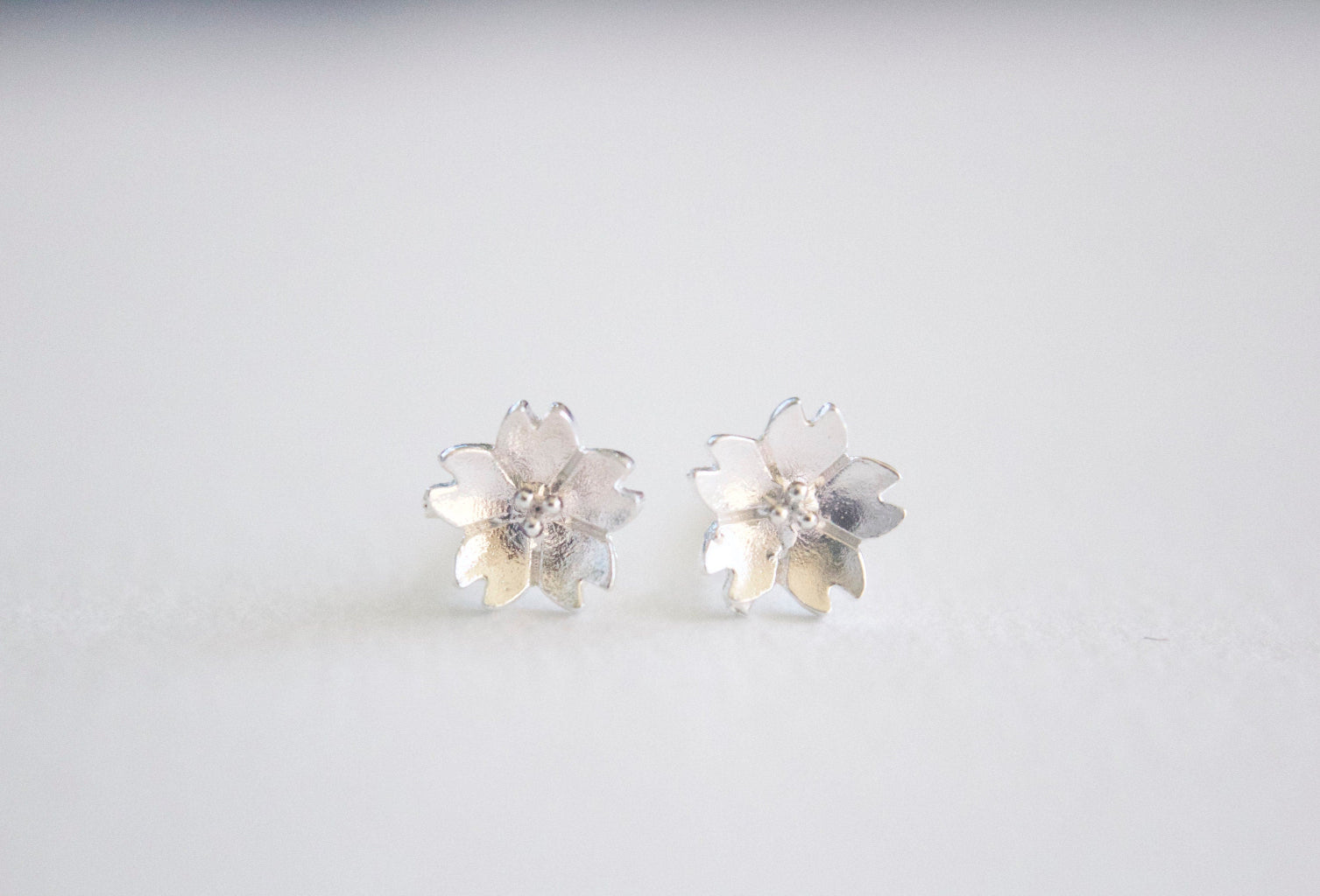 close up sterling silver floral stud earrings for sensitive ears