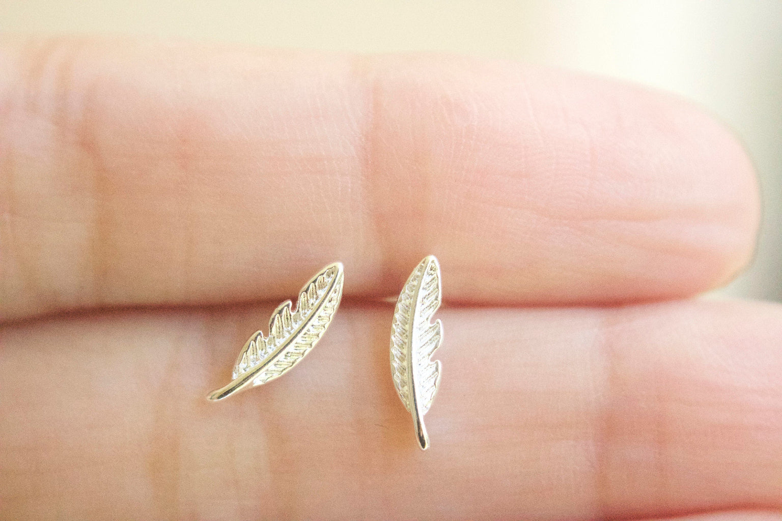 close up sterling silver leaf stud earrings for sensitive ears
