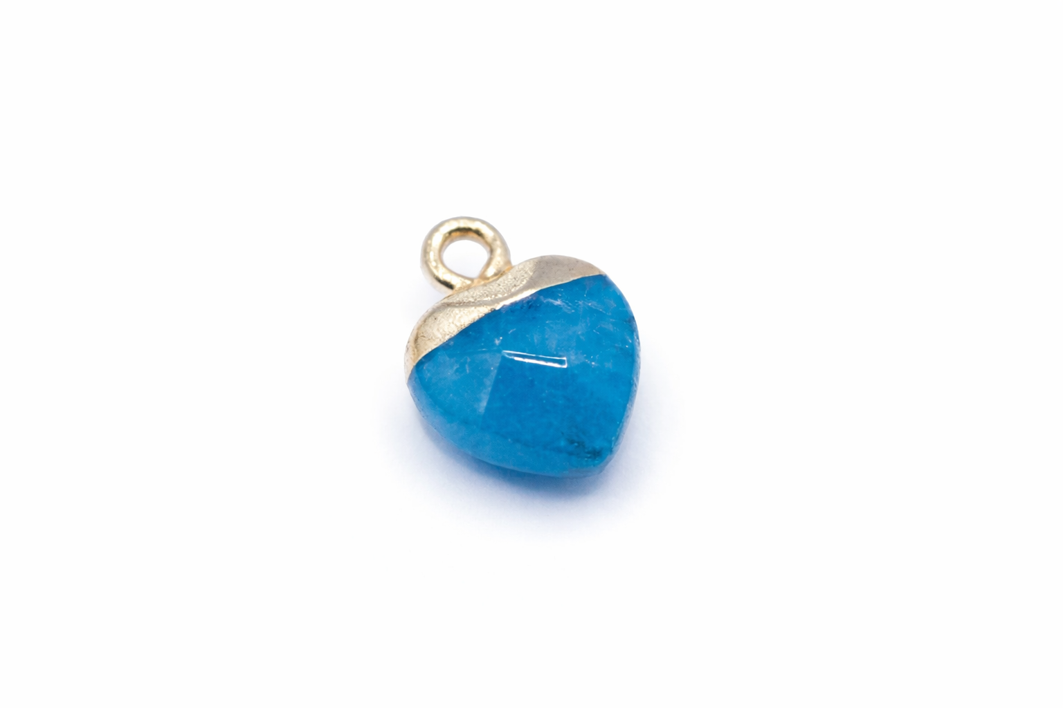 Blue teardrop pendant with gold edge on a white background