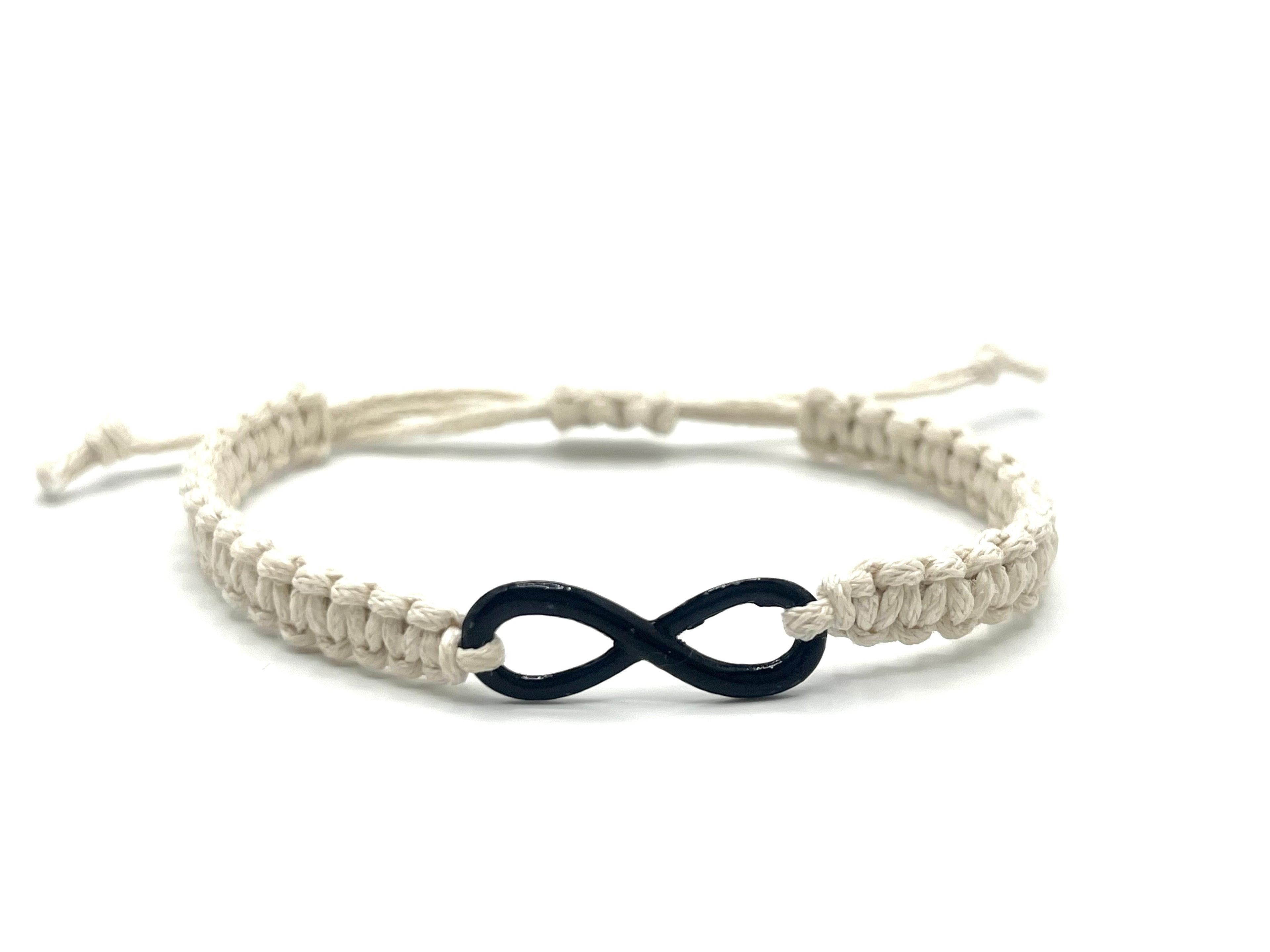 Bracelet with a black infinity symbol on a white background
