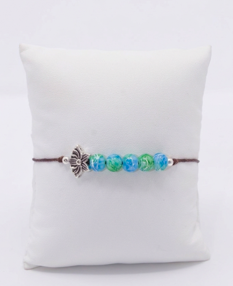 lotus bracelet with swirl blue and green beads 