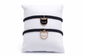 minimalist_cat_charm_bracelet_on_white_background