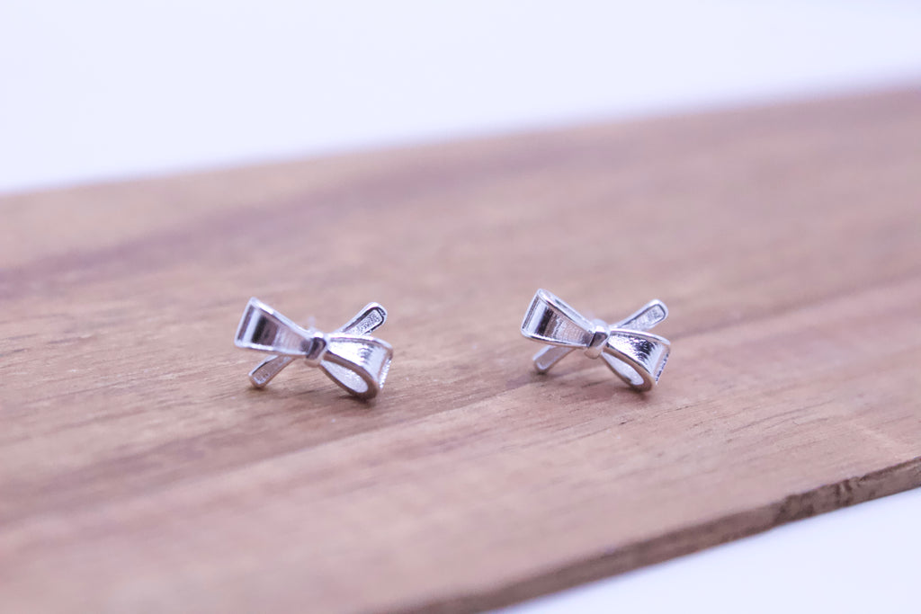 silver bow stud earrings minimalist everyday jewelry