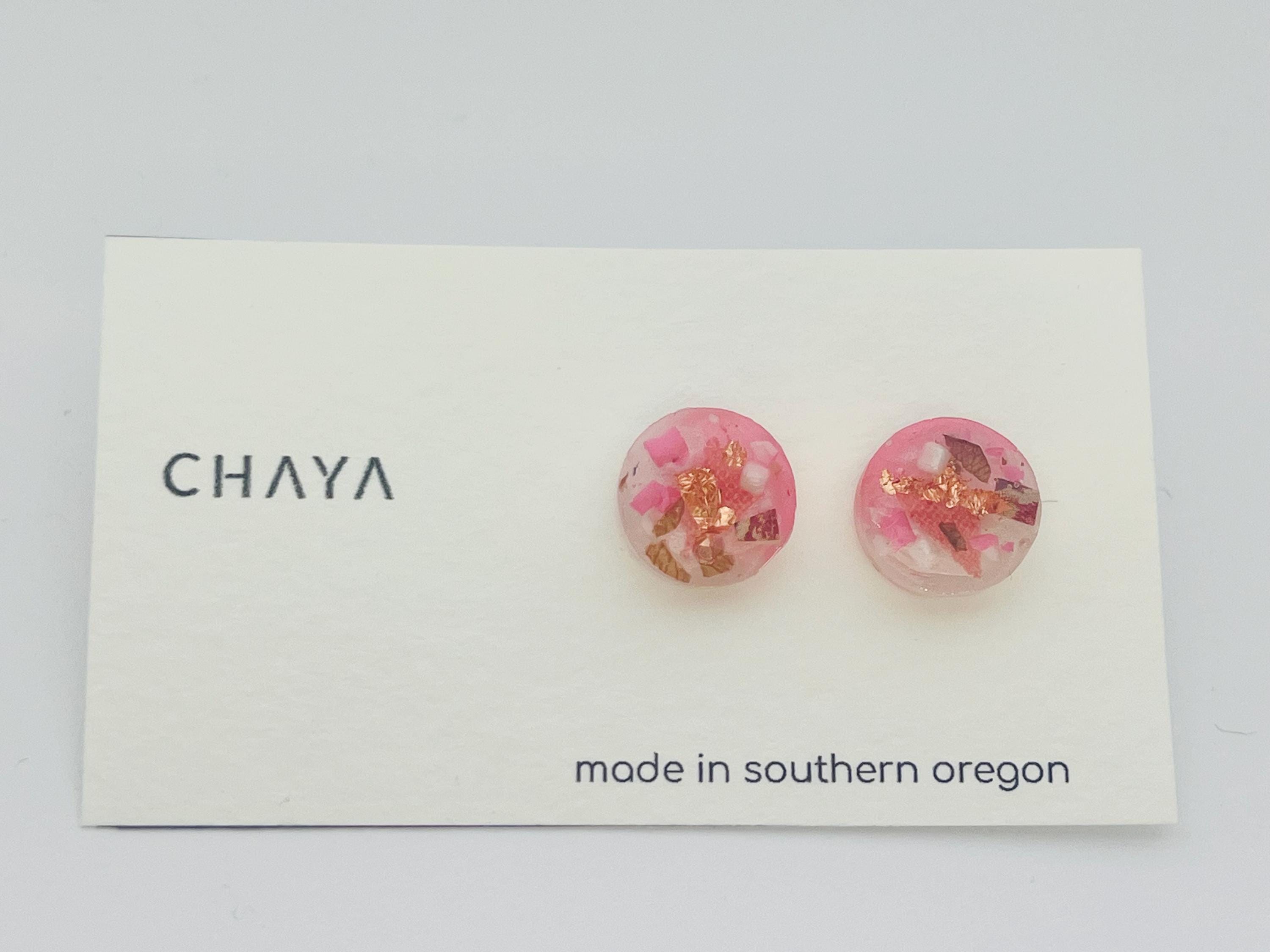 Pink floral earrings on a Chaya branded card with 'made in southern Oregon' text.